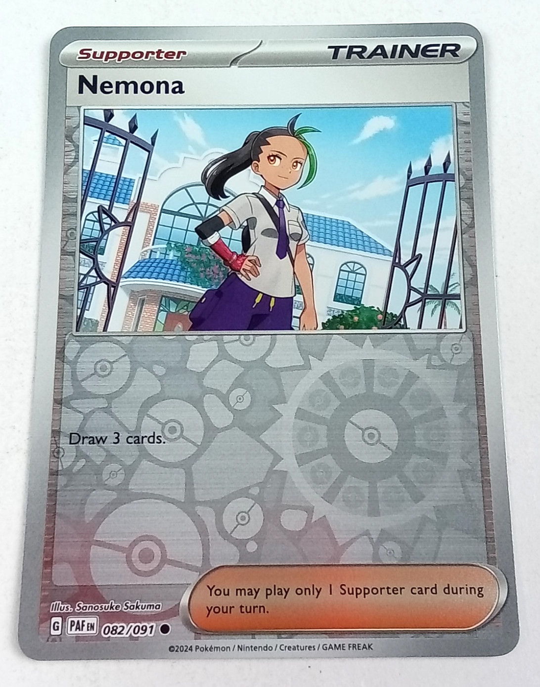 Nemona 82/91 Paldean Fates Reverse Holo Trainer Pokémon Card 2024