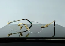 Miu Miu Logo SMU A54S 5AK08N Gold / Clear Lens Round Sunglasses Blue Control