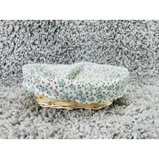 Small Wicker Basket With a Removable Cloth Liner Featuring a Teal Floral Pattern