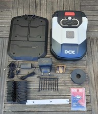 Robot tondeuse DCK KRDM106b fil guide, neuf, jamais utilisé, carton d'origine