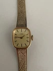 Vintage Wind Up Timex Ladies Gold Tone Wrist Watch Woven Band Working Condition
