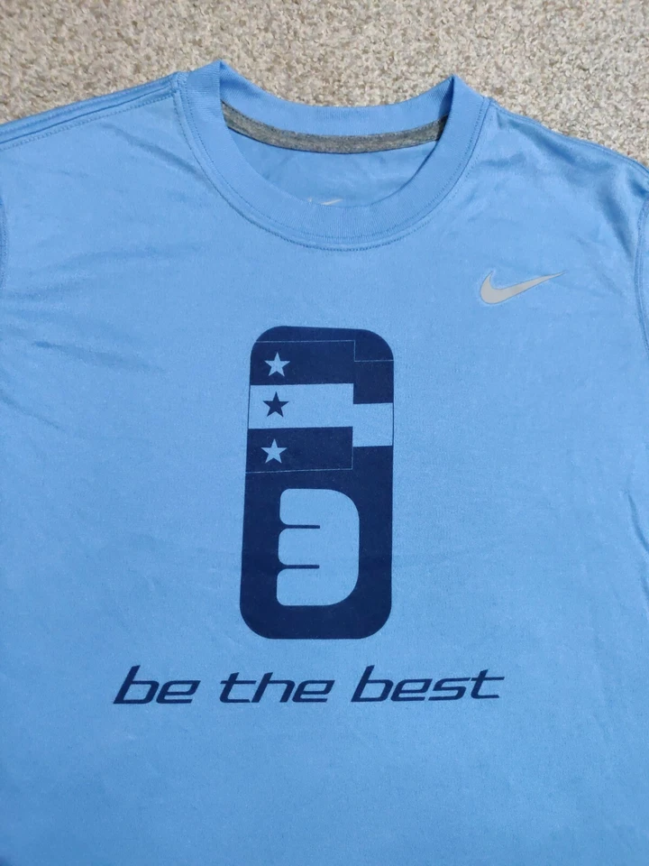 Camiseta deportiva Nike Training para niños Sé la mejor. Azul claro  Foto 3 de 4