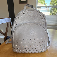 Michael Kors Gray Pebbled Studded Logo Zip Ba...