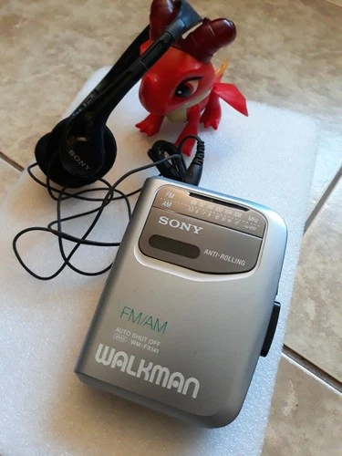 VTG Sony Walkman AM/FM Radio Cassette Player WM-FX141 And OEM Sony Headphones