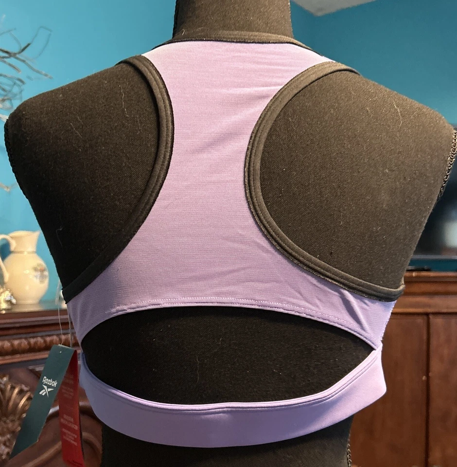 Sujetador deportivo Reebok Lux Racer para mujer talla Lg. Hyper Purple Studio Estudio Foto 2 de 4