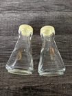 PYREX VINTAGE MCM SALT & PEPPER SHAKERS YELLOW LID 4.75" TALL PREOWNED FREE SHIP