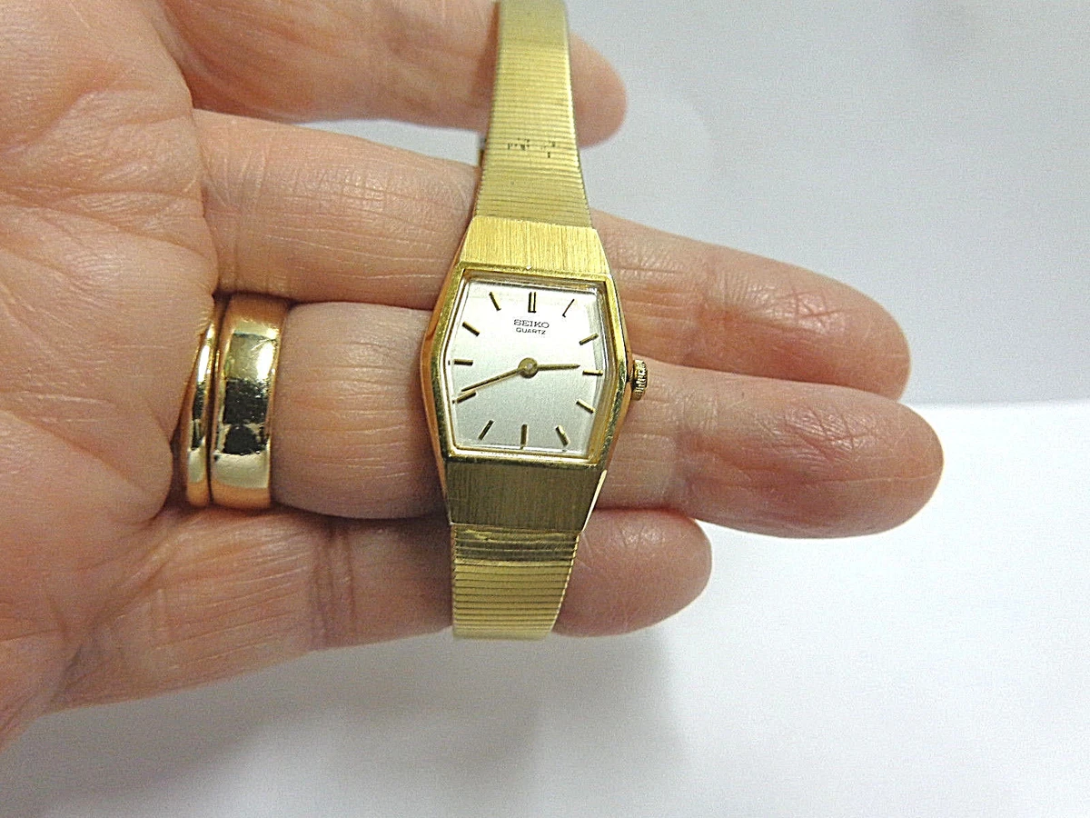 Seiko gold watch white face clearance