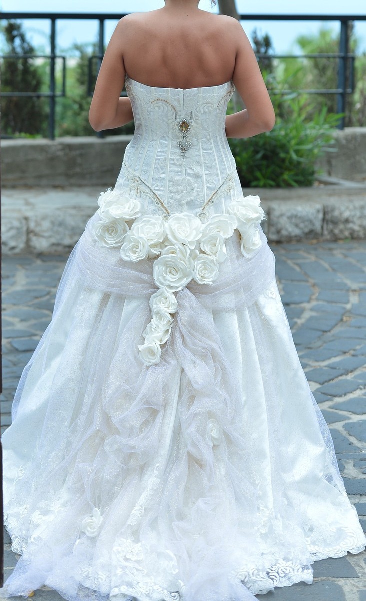 Preowned Pucchi 9301 strapless wedding dress, color ivory