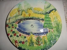 BLUE HOLE DECORATED WALL PLATE W/BLUE HOLE ON TOP 8.5"