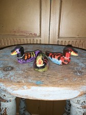 SET OF THREE HAND CARVED WOODEN DUCKS