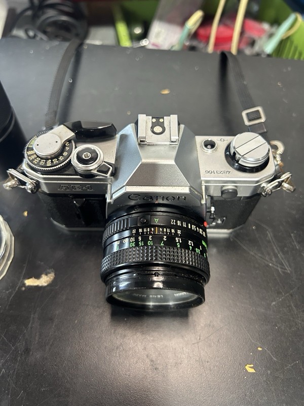 Canon AE-1 35mm Film Camera W/ Canon 50mm 1:18 & 2 Chinar Lens + more
