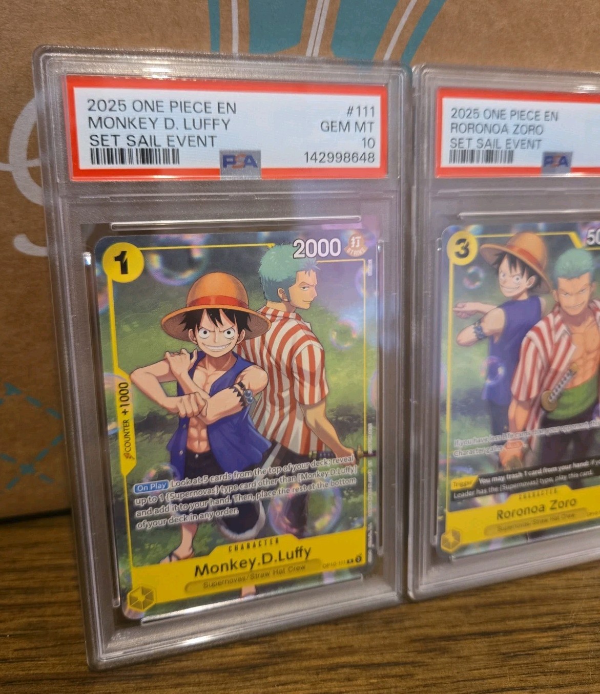 2025 One Piece Set Sail Event Monkey D. Luffy & Zoro Sequential PSA 10 GEM SET view 2