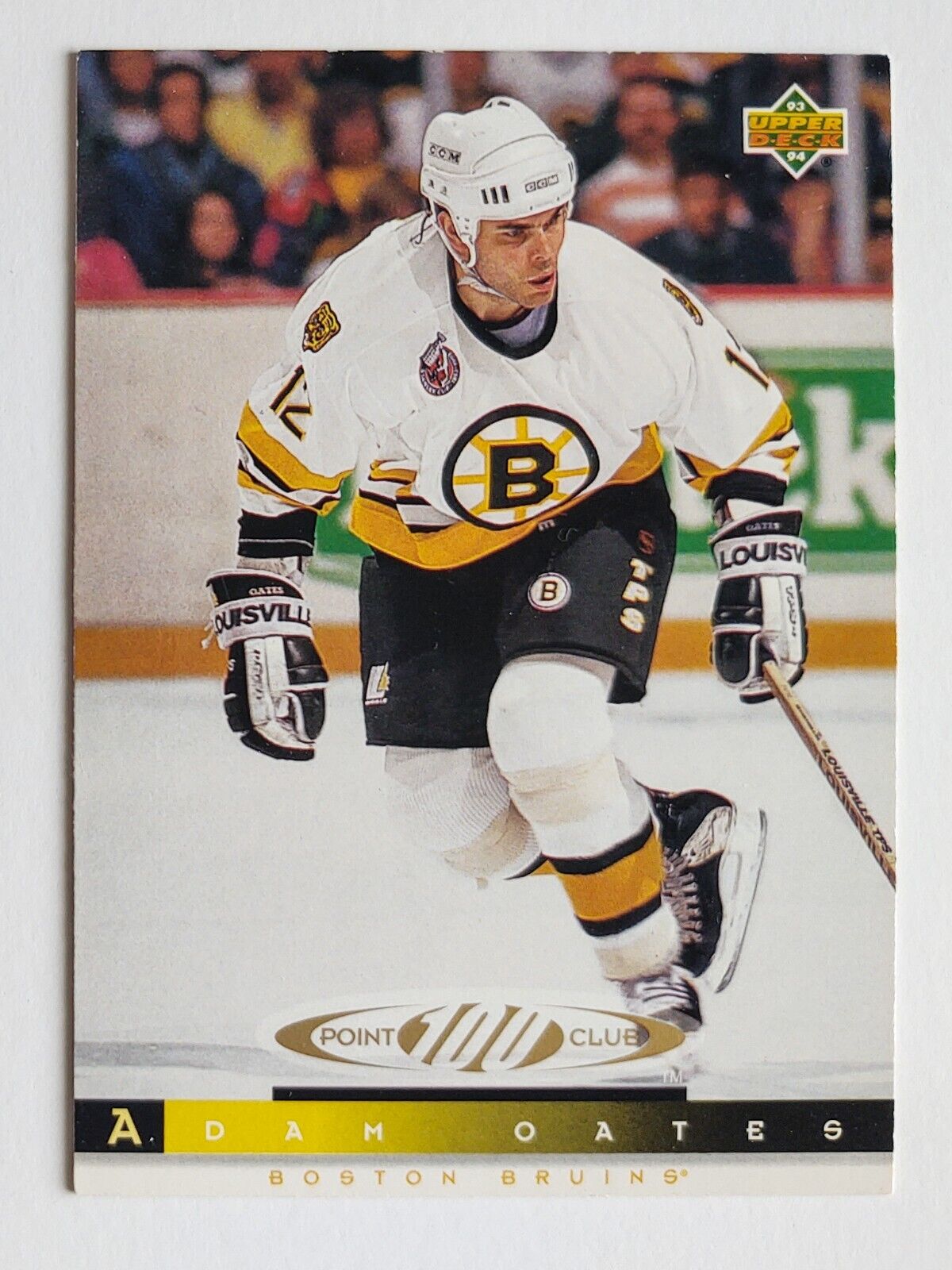 Adam Oates of the Boston Bruins skates on the ice during an NHL game