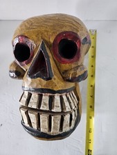 Large carved wooden skull