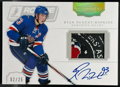 Nugent-Hopkins - 2011-12 Panini Dominion Rookie Showcase Dual Puck Autos #13 - Image 1 of 2