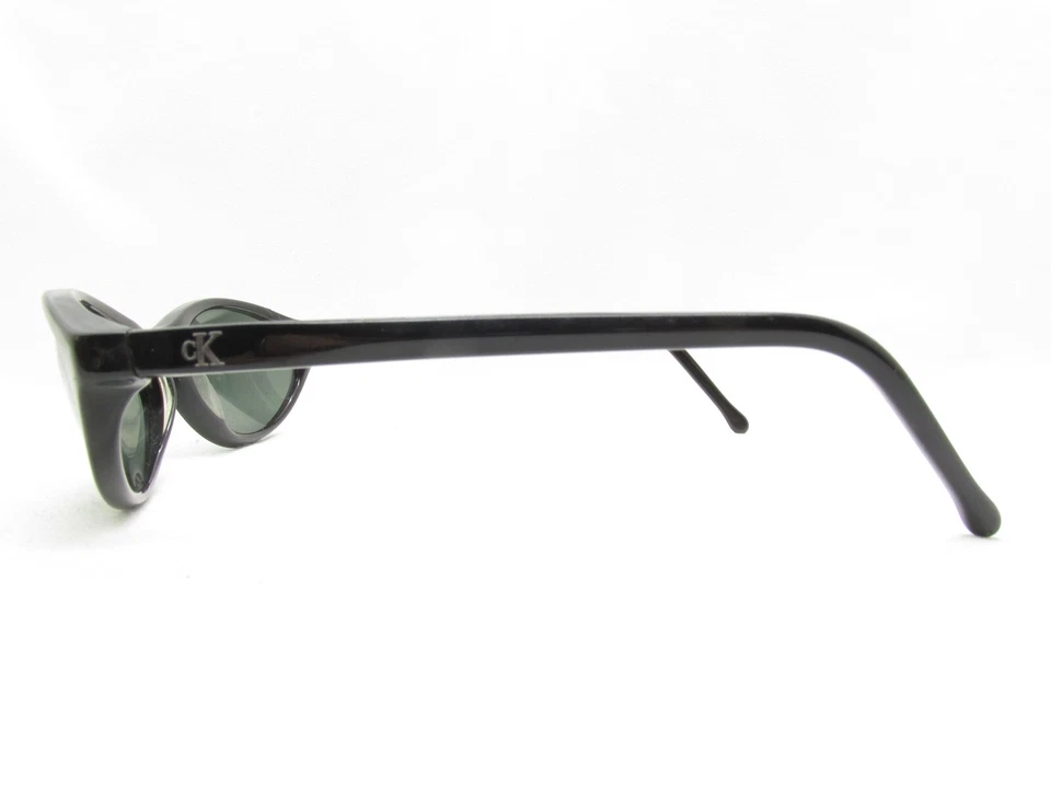 GAFAS DE SOL CALVIN KLEIN 4016 51 NEGRAS ENVOLVENTES DEPORTIVAS OVALADAS 57-18-130 118116 Foto 3 de 4