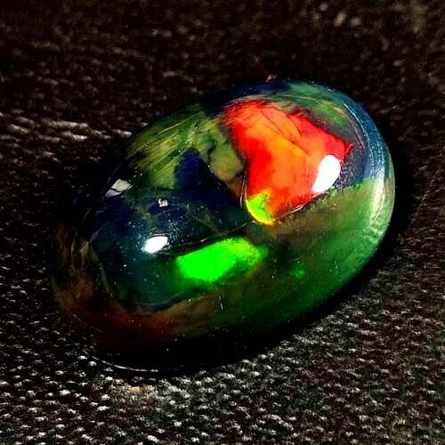 NATURAL AAA VVS SUPREME PLAY OF COLOR OVAL CABOCHON ETHIOPIAN BLACK OPAL 2.40CTS