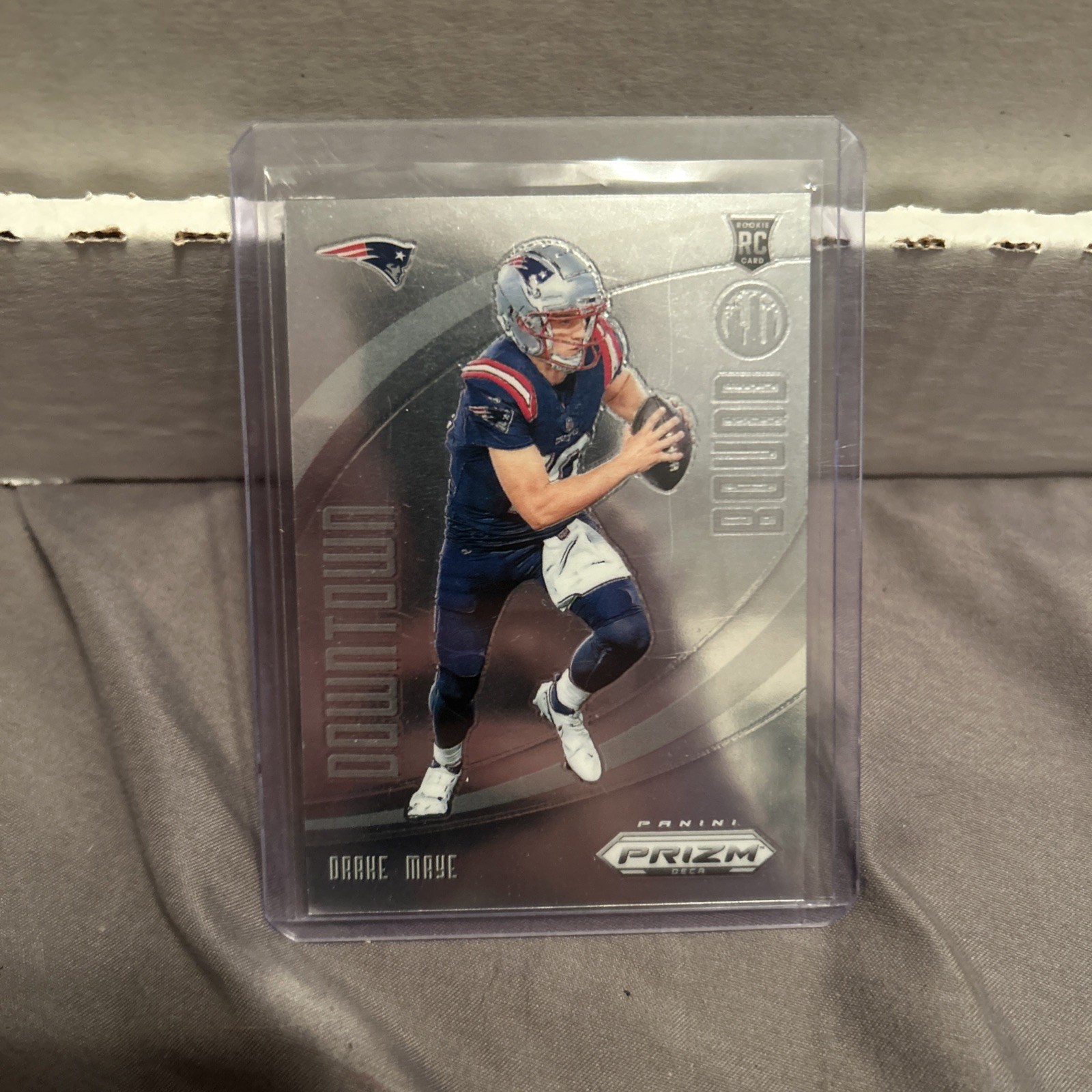 2024 Panini Deca Prizm Football DRAKE MAYE Patriots Downtown Bound Rookie Insert