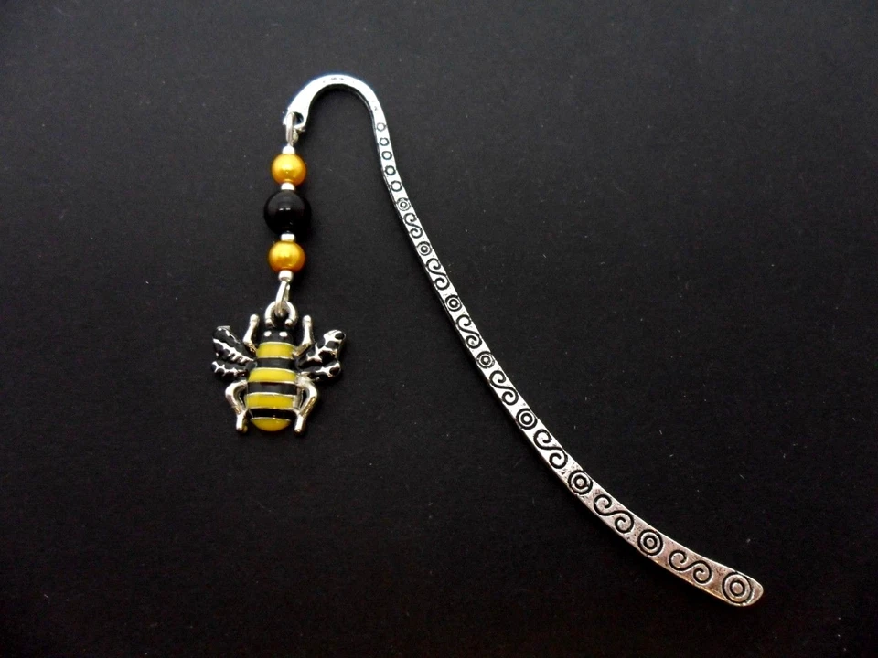 A TIBETAN SILVER AND HONEY BEE CHARM BOOKMARK. NEW.