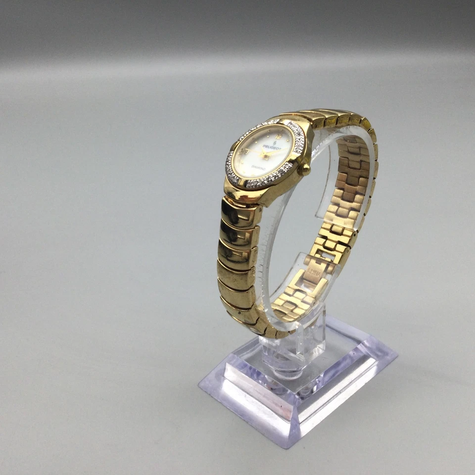 Reloj Peugeot Diamante Mujer 22mm Tono Dorado Cuadrante MOP Batería Nueva 6.25" Foto 4 de 4