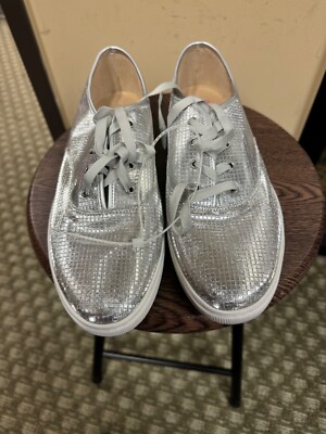Women NWOT ''Cooper Key'' shinny silver  lace up sneakers. Size 10M