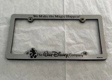 Walt Disney Co Cast License Plate Frame Silver Plastic We Make the Magic Happen