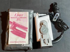 Oster Travel Iron with Spray Mini Iron with Dual Voltage 120/240 V White