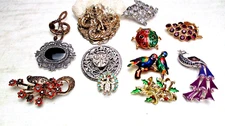 Lot O 12  Brooches See Pictures For Details