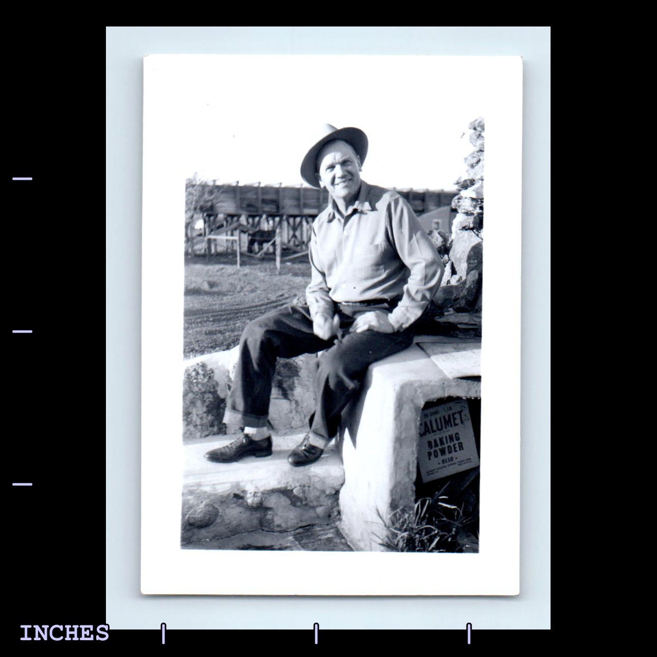 Vintage Calumet Baking Powder Sign with Man Sitting on Wall