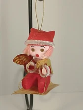 1972 Vintage Red Flocked Christmas Gold Foil Winged Angle On Sled Ornament