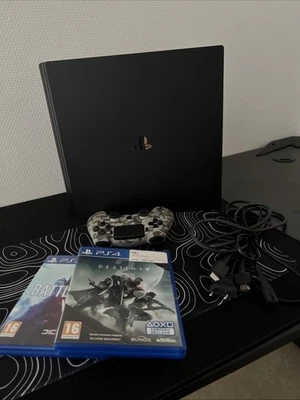 Console Sony PlayStation 4 Pro 1 To Noire + Câbles + Manette + 2 Jeux - Formatée - Photo 1/4
