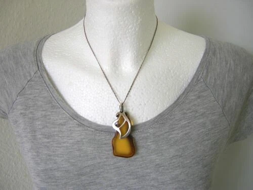 Collane e ciondoli antichi in pietra principale ambra