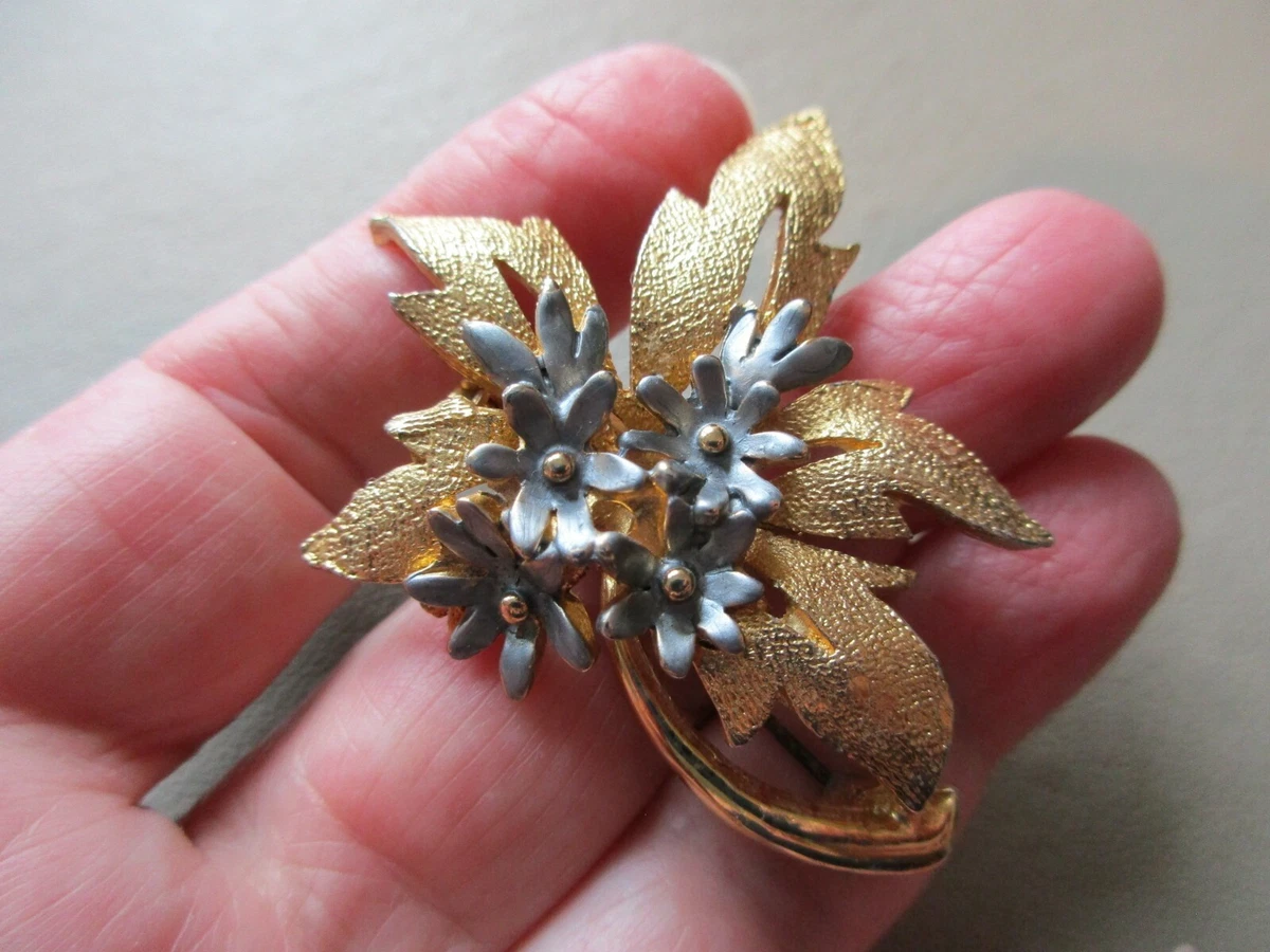 Hollywood stamped brooch deals