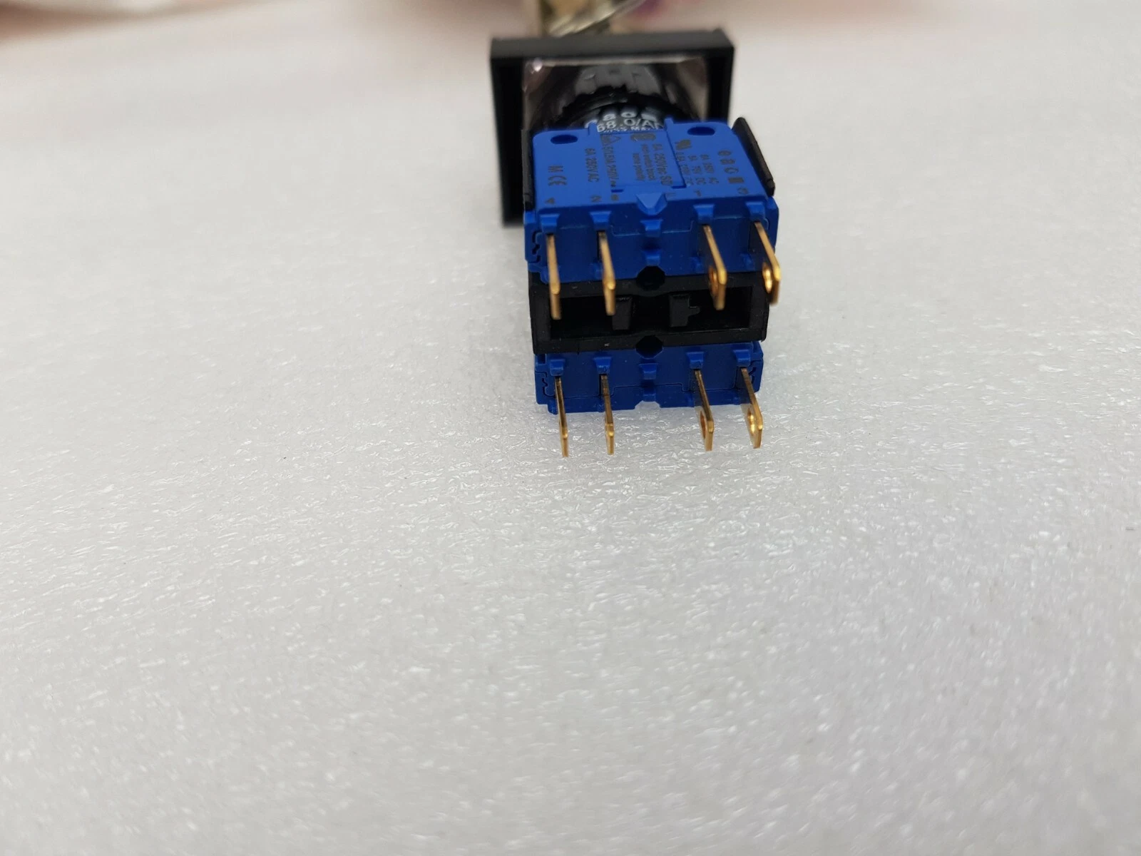 Two stacked blue switching blocks with gold-plated terminals on the EAO key switch