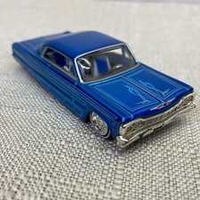 1964 Chevrolet Chevy Impala Blue Homie Rollerz Jada Diecast Car 164 Scale 1964 Chevrolet Chevy Impala Blue Homie Rollerz Jada Diecast Car 164 Scale