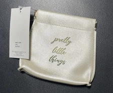 Capelli Small Golden Colored Snap Pouch     “Pretty Little Things”