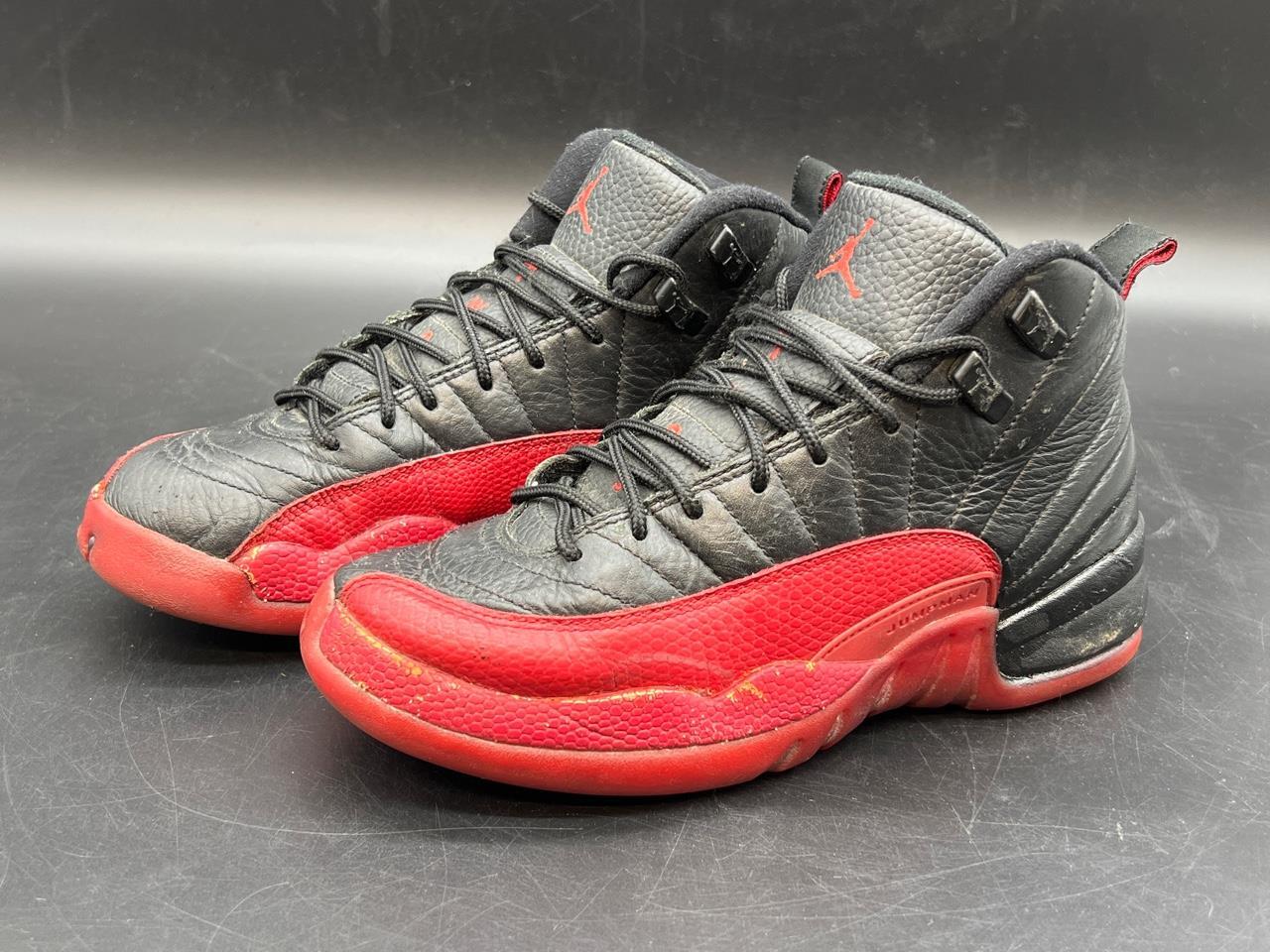 black and red jordan 12