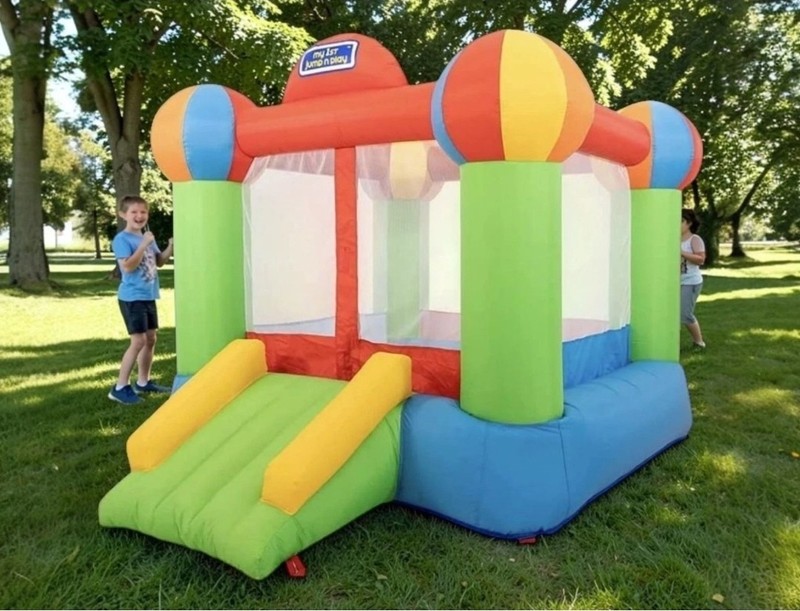 Sportspower My 1st Jump 'n Play bounce house with a slide