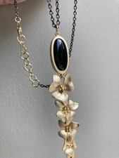Art nouveau style floral cascade necklace with onyx gemstone on gunmetal chain