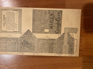 1889 Hires Root Beer & Cough Cure cutout log cabin