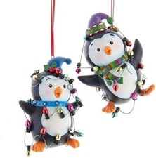 Kurt S. Adler 3.25-Inch Black and White Penguins With Colored Lights...