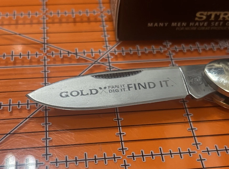 Navaja de bolsillo Rr1521 Rough Rider Gold Flake Canoe asas de celuloide en escamas doradas Foto 2 de 4