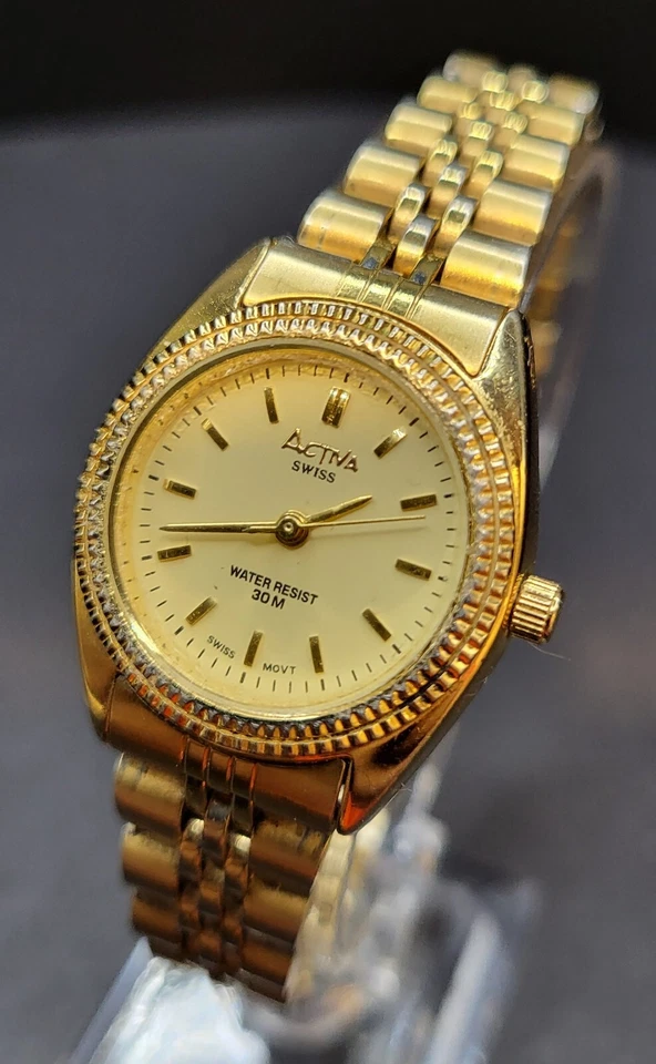 Reloj de cuarzo vintage suizo Activa tono dorado para dama de 25 mm WR 30m pulsera de acero Foto 2 de 4