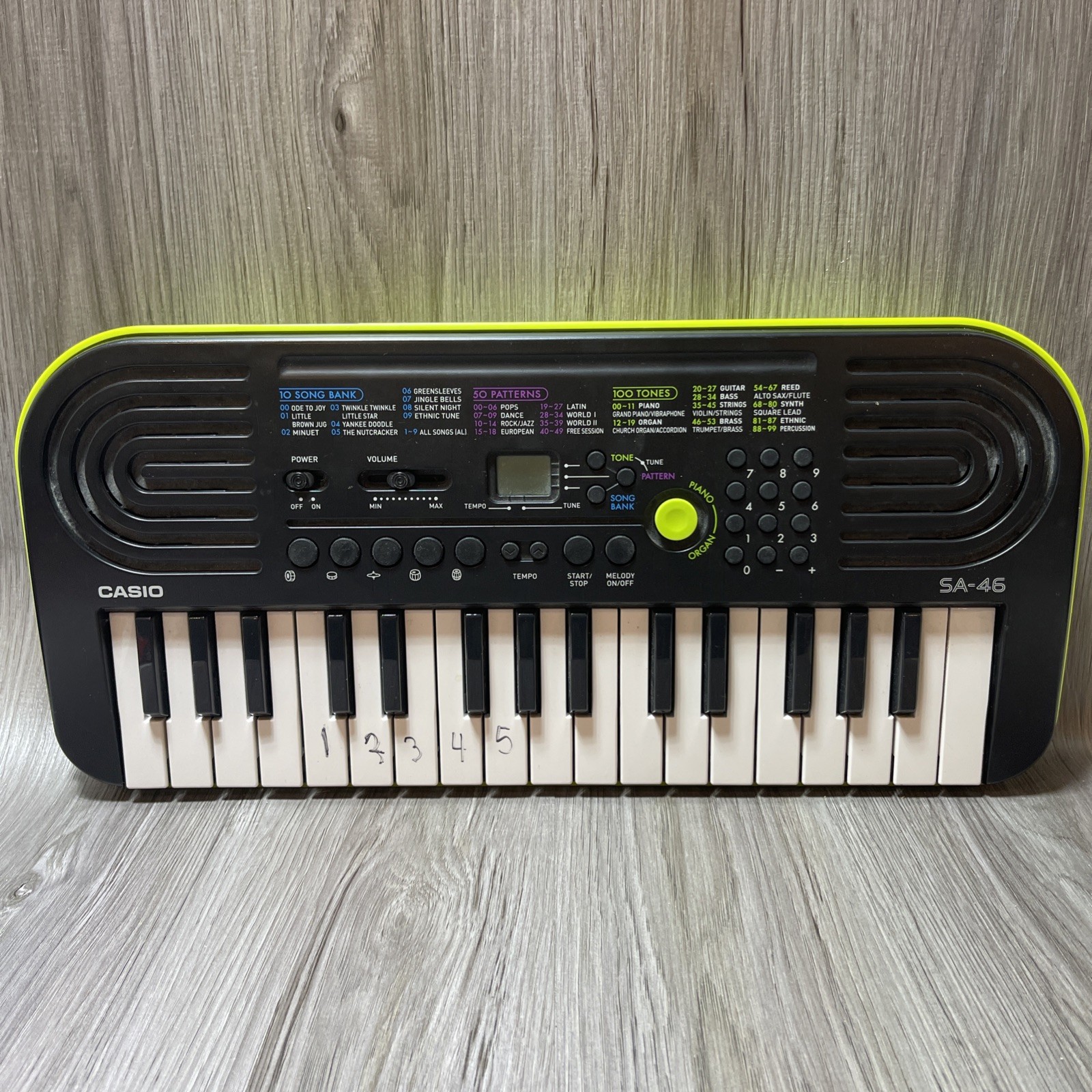 Casio SA-46 32-Key Mini Electronic Keyboard Black Green Battery Powered
