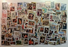 Timbres Monde Lot de 300 tableaux neufs et oblitérés tous différents