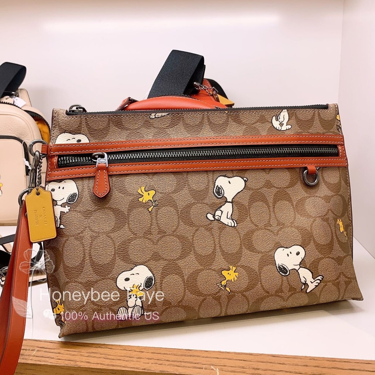 NWT Coach X Peanuts MEN'S Carry All Pouch In Signature NWT Coach X Peanuts MEN'S Carry All Pouch In Signature