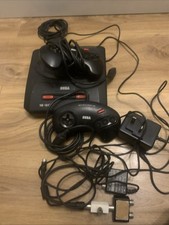 Sega Mega Drive 16-Bit Black ConsolewithControllers good condition no games runs