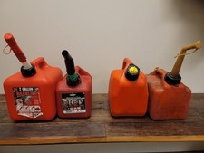 Lot of 4 Plastic Gas Cans - 2 New 2 Used - 1 Gallon to 2 Gallon