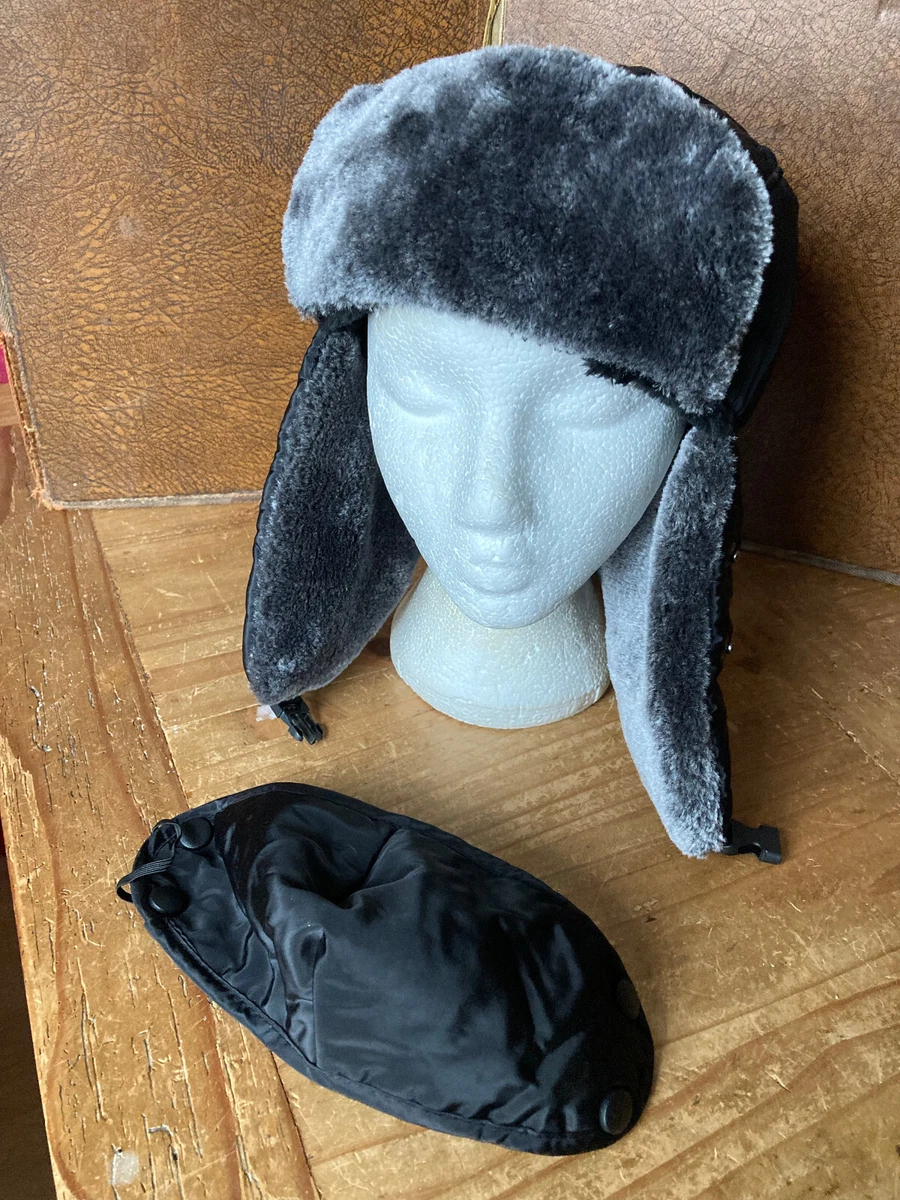 Trapper hat with peak outlet