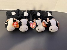 Lot of 4 TY Beanie Babies "Daisy"